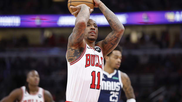 Chicago Bulls forward DeMar DeRozan (11) shoots a free throw against the Dallas Mavericks during the first half at United Center.